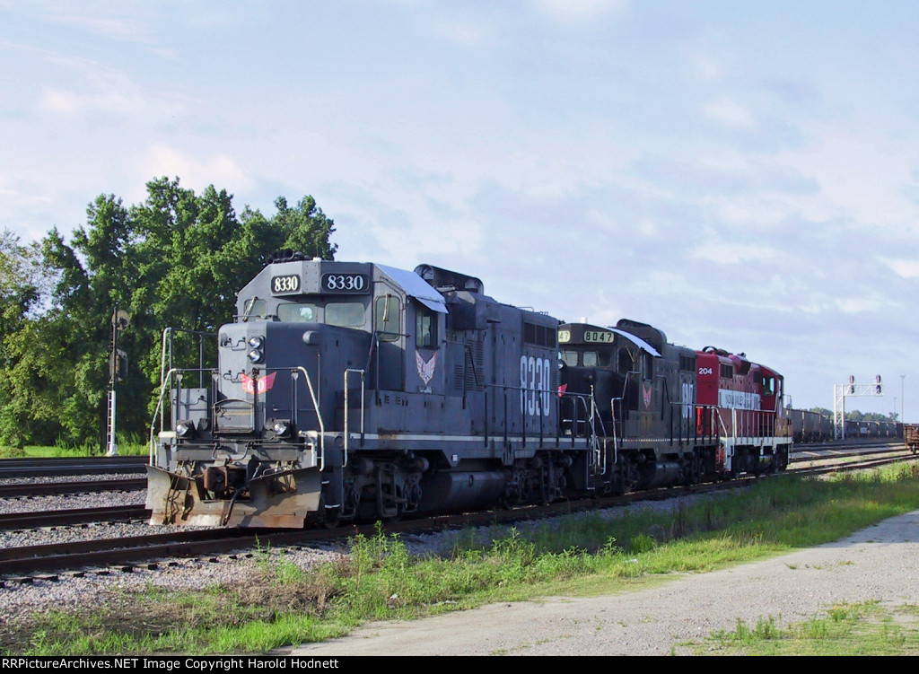 YVRR 204 sits with a couple of other Geeps in a siding